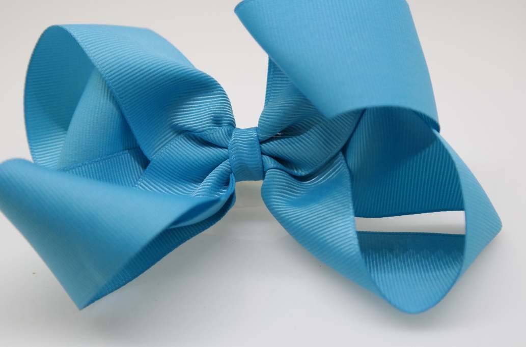 Itty bitty tuxedo hair bow Color: Turquoise